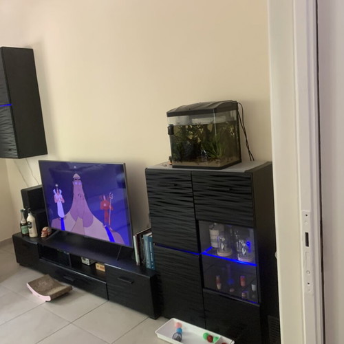 Living room unit with display cabinets and LED lighting