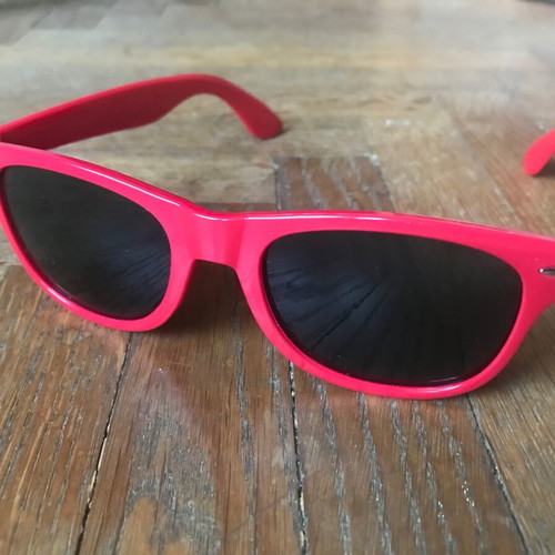Sunglasses like new with red plastic frame