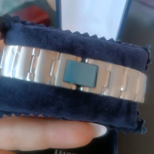 Women's Oskar de la Renta titanium watch completely new