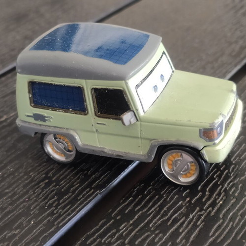 Disney Cars Miles Axlerod 1:55 toy car used, moderate condition