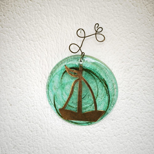 Glass and bronze wall decoration with sailboat