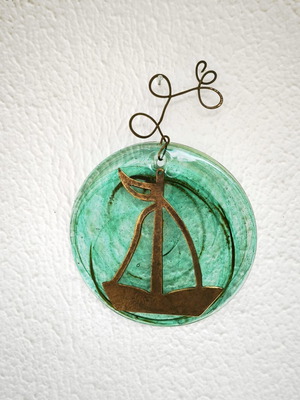 Glass and bronze wall decoration with sailboat