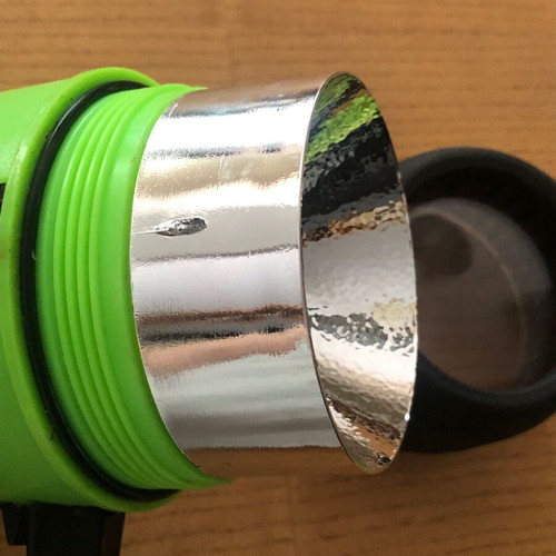 Underwater Kinetics UK1200 halogen underwater flashlight used with handle and strap