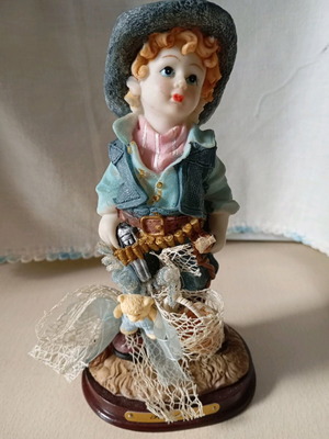 Little boy figurine 16 cm like new with lace details
