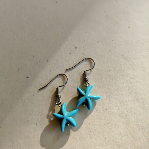 Handmade earrings with blue starfish