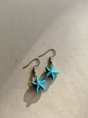 Handmade earrings with blue starfish
