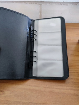 Card holder with four sleeves used