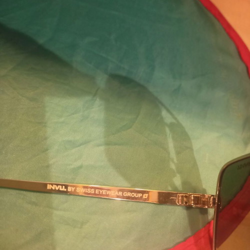 Invu sunglasses like new, gold color