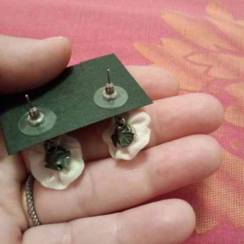 Fwo earrings with white fabric flowers and rhinestones hanging, unworn