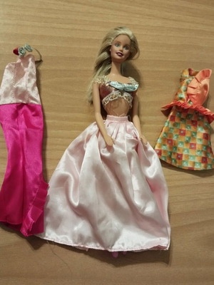 Barbie doll and clothes like new