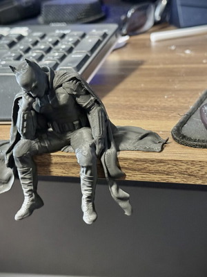 Sad Batman Sitting on a Ledge Figurine made to order