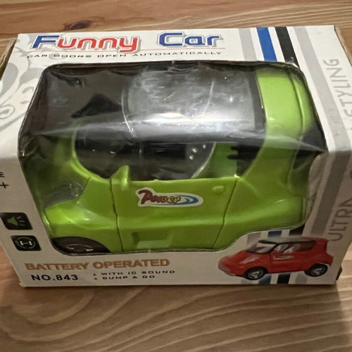 Funny Car battery toy like new, intact in its box