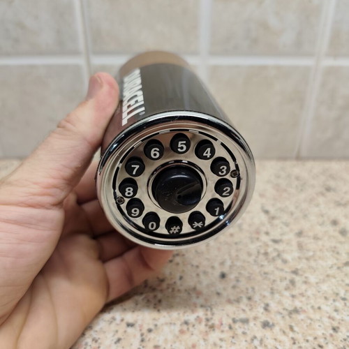 Vintage telephone shaped like a battery, like new