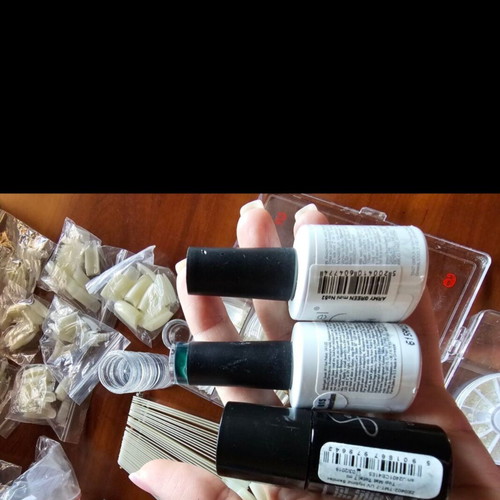 Nail art equipment used with tips, top coat, quickgel, and tools