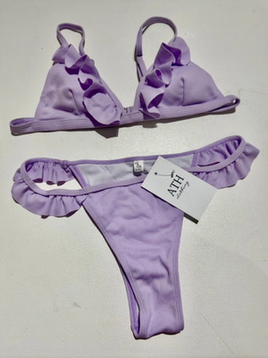Swimsuit new with tags size L purple bikini lining