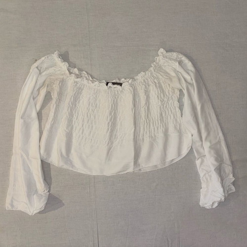 White blouse with ruffles and long sleeves like new