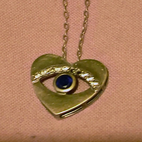 Sterling silver 925 heart eye necklace like new with zircon