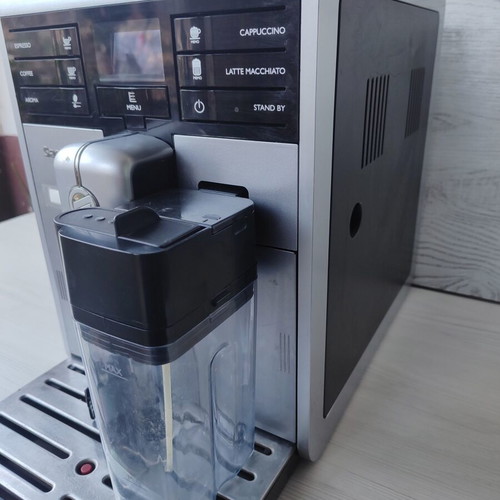 Saeco Moltio One Touch Cappuccino espresso machine with milk carafe and bean switcher