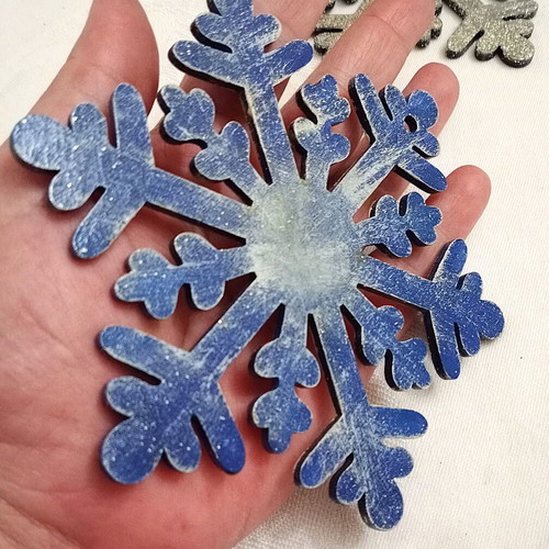 Wooden snowflake elements used, pack of 2, blue with silver glitter