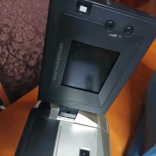 Hitachi video camera used with foldable screen and VHS cassette