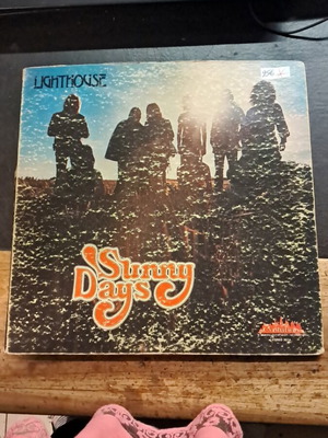 Lighthouse Sunny Days record used, good condition