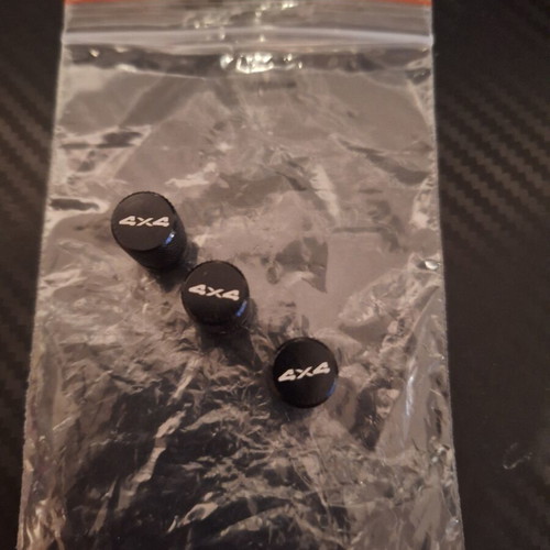 4x4 Valve Caps for Jeep carbon, like new, set of 3