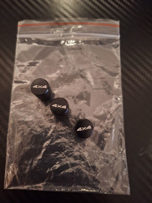 4x4 Valve Caps for Jeep carbon, like new, set of 3