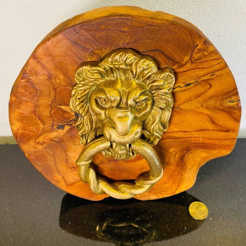 Bronze door knocker used with lion head and wooden base
