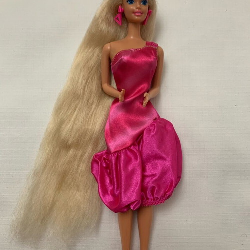 Totally Hair Barbie used with long hair and original earrings