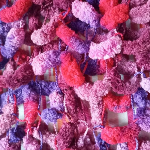 Handmade knitted scarf new with tassels in red and purple tones