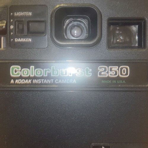 Polaroid Colorburst 250 camera used with original strap