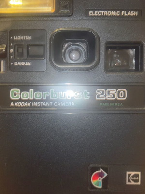 Polaroid Colorburst 250 camera used with original strap