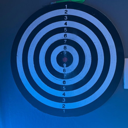 Target used with 2 darts, green and red