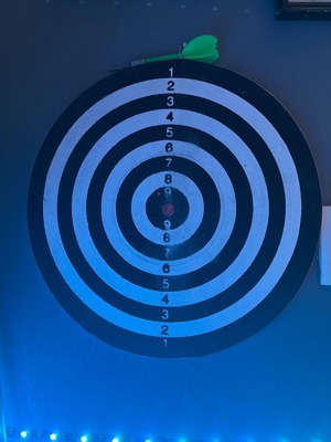 Target used with 2 darts, green and red