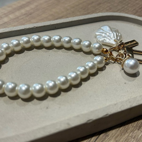 Handmade keychain with white pearls new