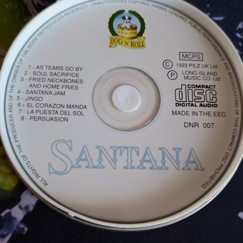 Santana Dog N Roll collector's edition in metal box like new