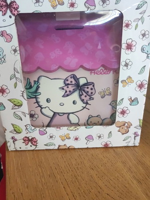 Hello Kitty Sanrio piggy bank new in box, pink design