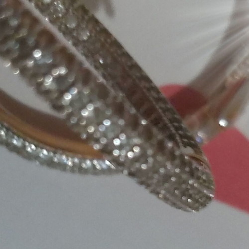 Gold hoop earrings with zircon stones