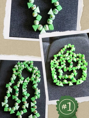 Green necklace type choker like new with geometric beads