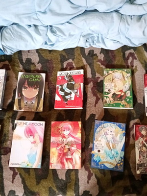 Manga collection like new with cup, volumes from various series