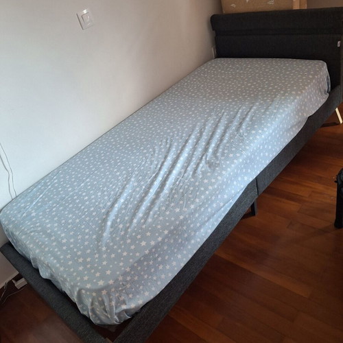 Single bed with Media Strom mattress like new, fabric frame