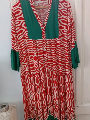 Long summer dress made of English fabric.
