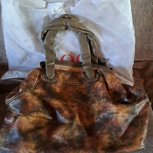 Doca shoulder bag dark color like new