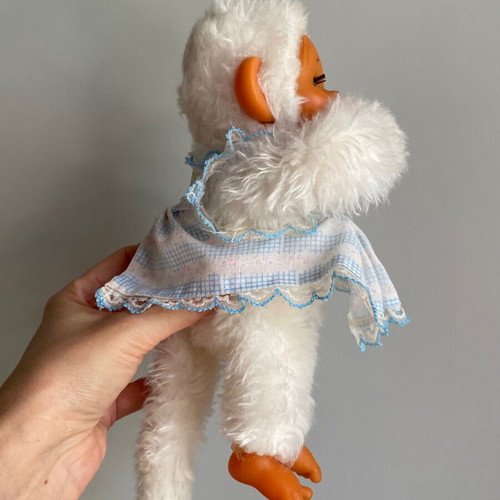 El Greco vintage white monkey plush toy in dress