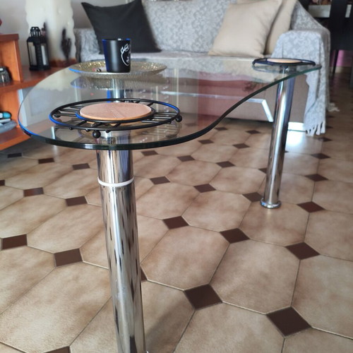 Glass coffee table with metal legs
