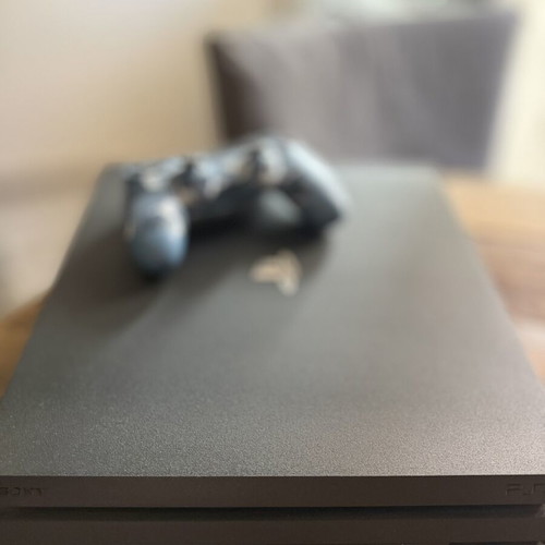 Sony PlayStation 4 Pro console with controller