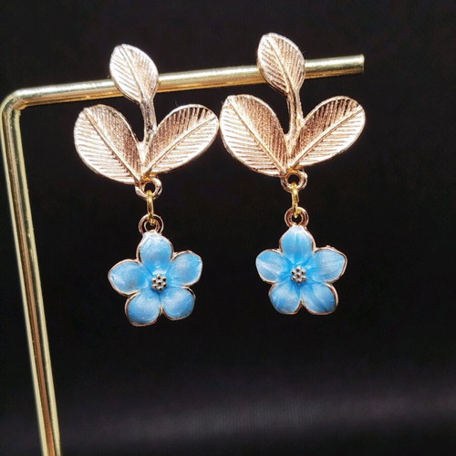 Handmade hypoallergenic earrings with blue iridescent flowers