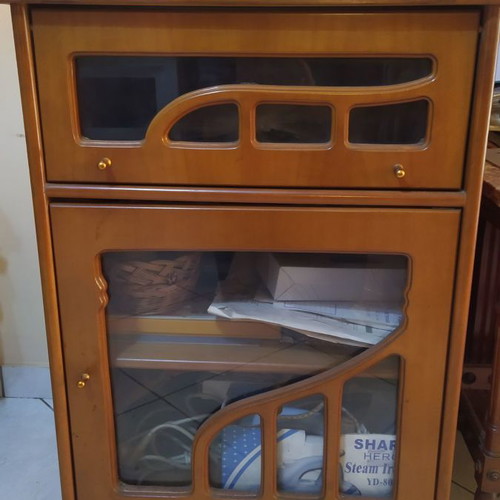 TV cabinet used with rotating surface and DVD player space