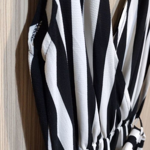 Striped polyester one-piece used, medium size with waist tie