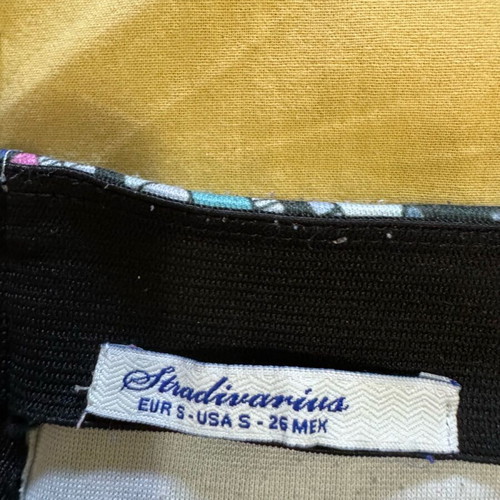Stradivarius mini skirt with geometric pattern, size Small, like new